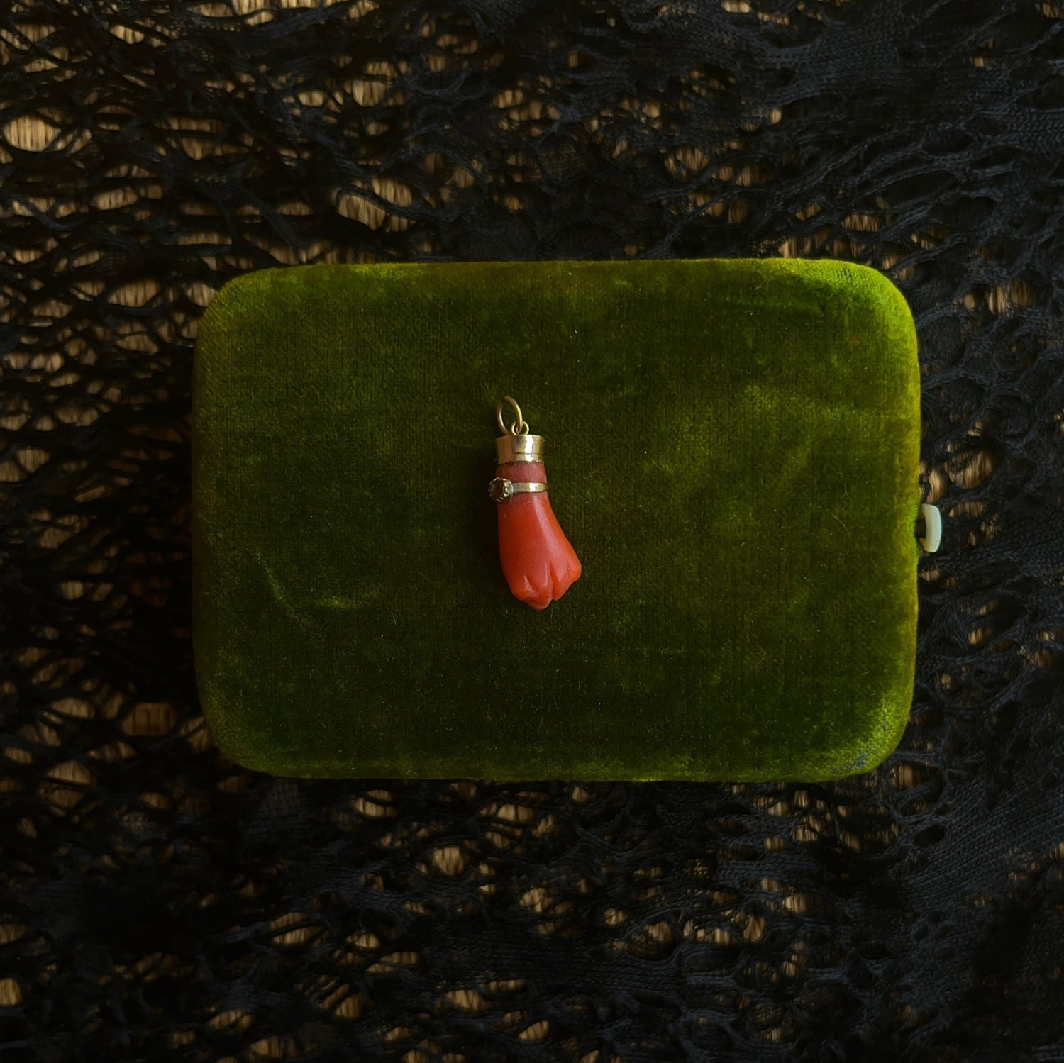 19th c. Carved Coral Fist Pendant | As Is