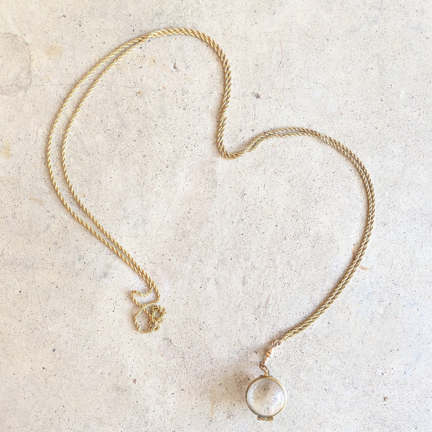 Early 20th c. Pools of Light Locket + Chain